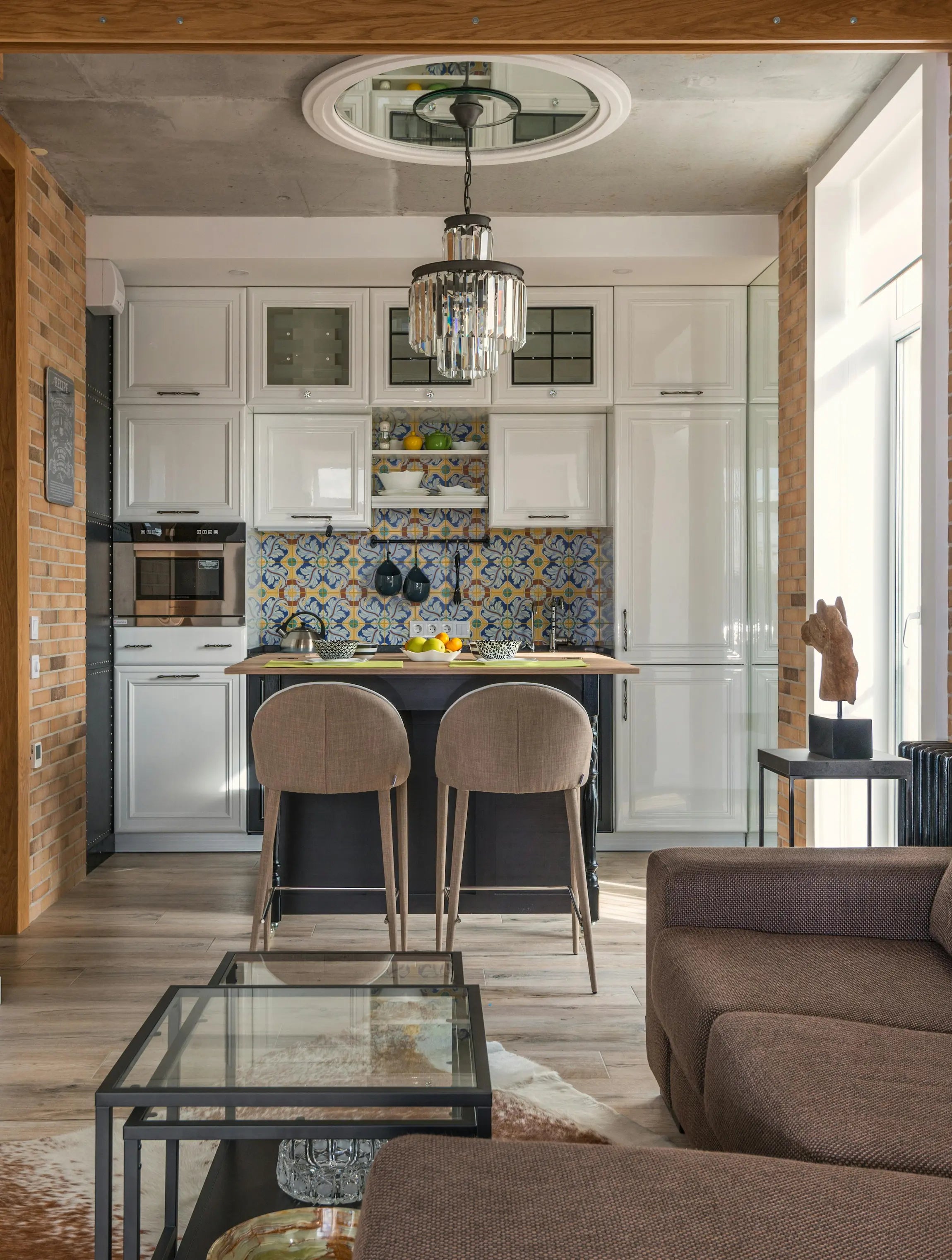 Modern cabinet pulls in contemporary kitchen with colorful backsplash - matte black handles