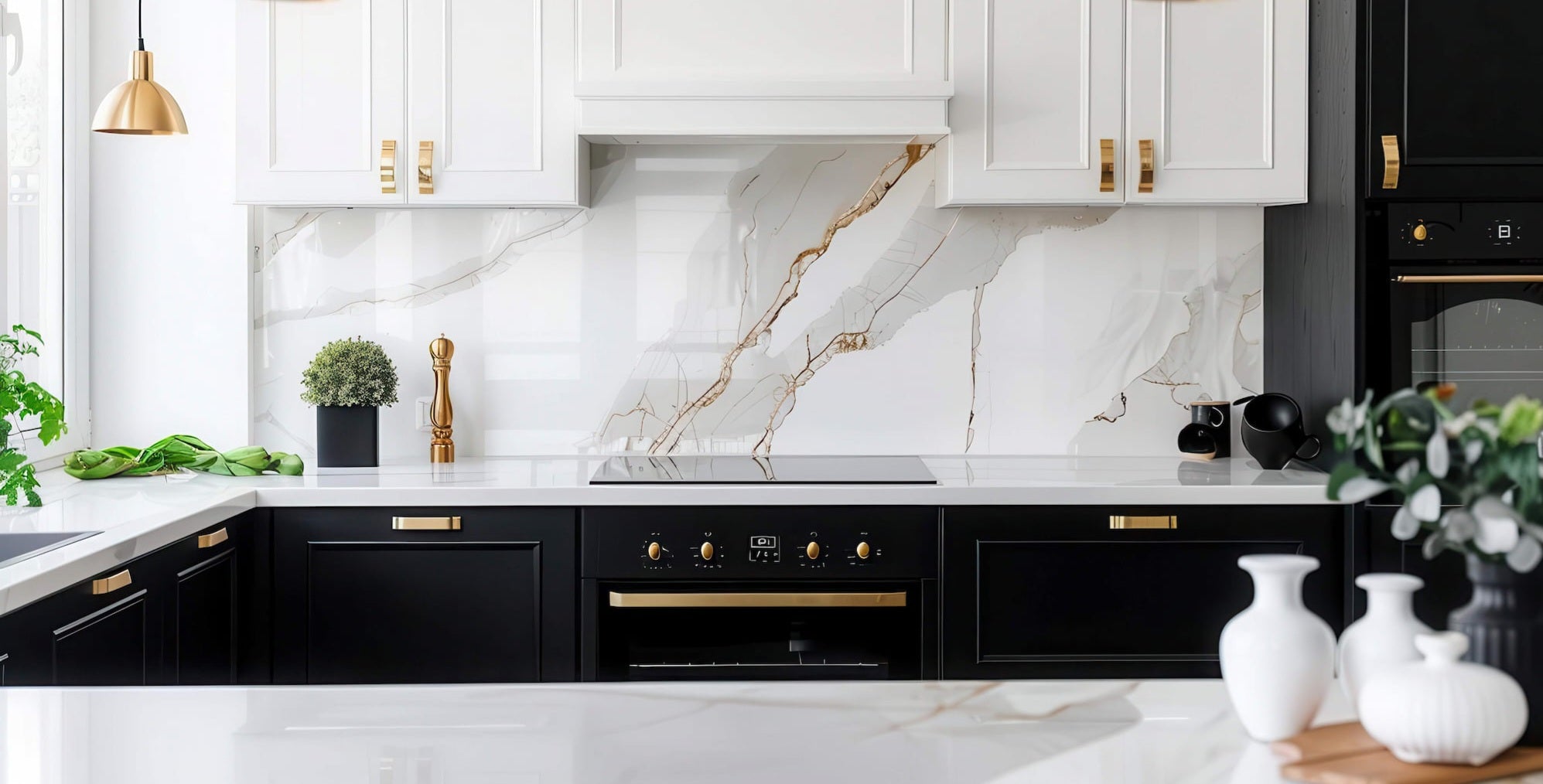 Modern cabinet pulls and knobs in brass tones for contemporary white cabinets in kitchen