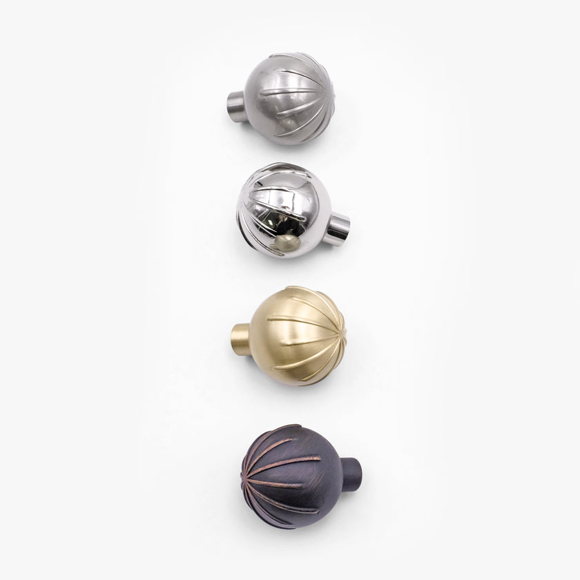 Sunburst cabinet knobs in nickel, brass, bronze, and polished finishes