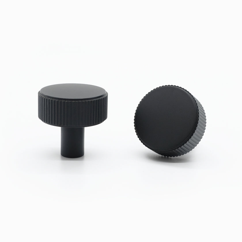 Industrial cabinet hardware – knurled and bold modern pulls and knobs in matte black and satin brass