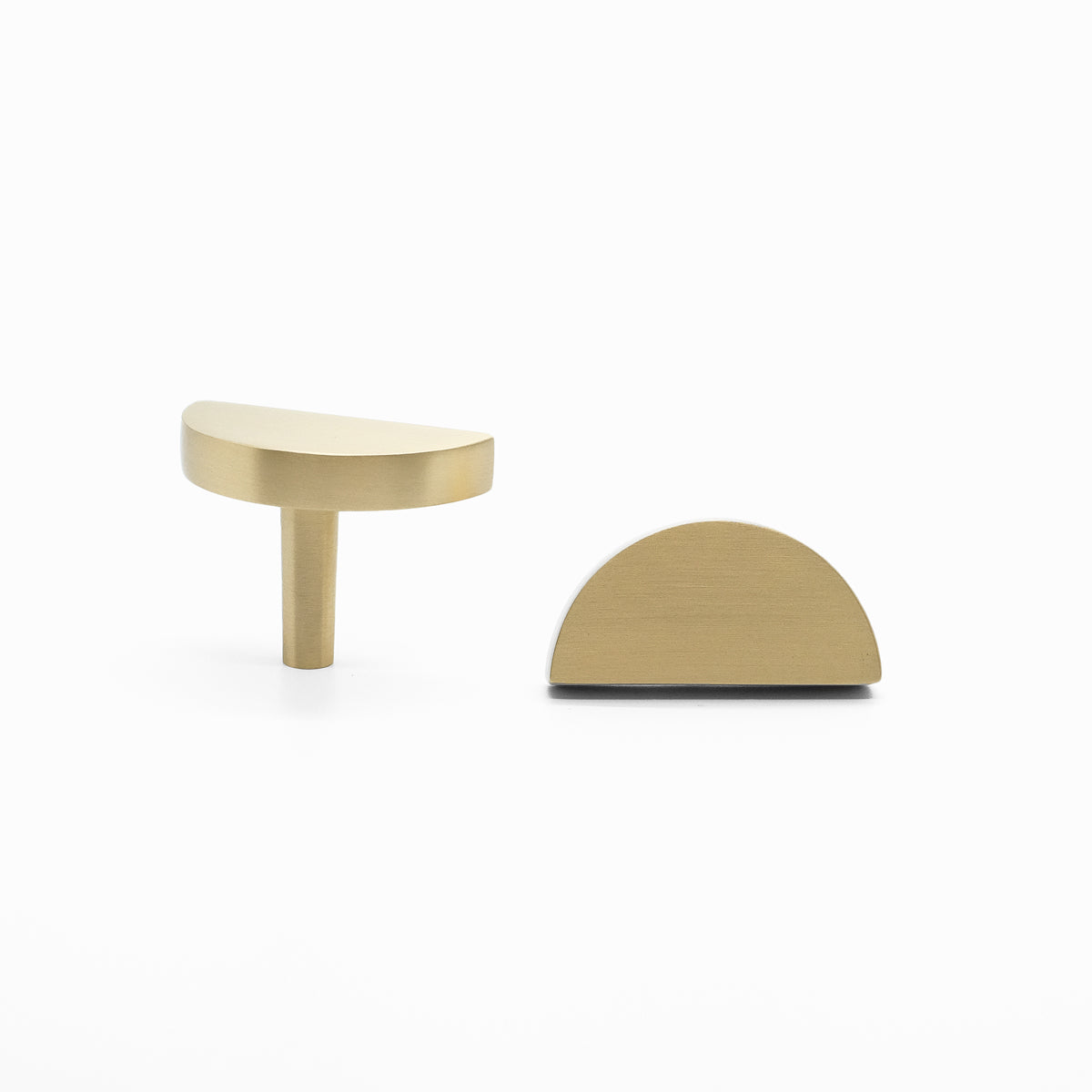 Modern half moon knob with curved side and straight lines in satin brass -contemporary design