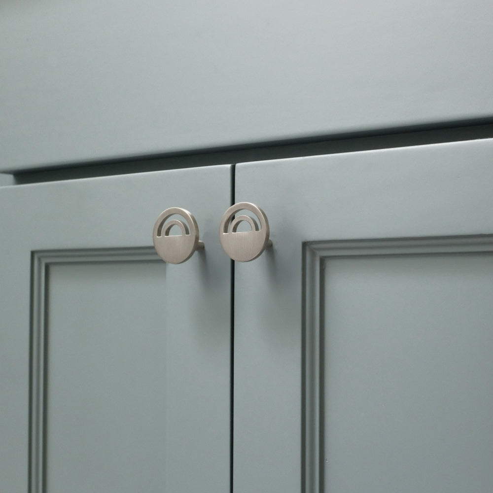 Horizon knobs in satin nickel on gray modern cabinet doors