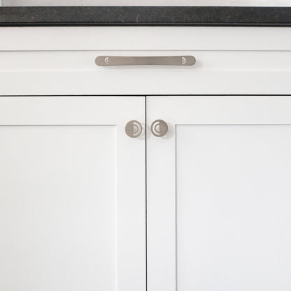 Horizon pull and knob collection in satin nickel in modern kitchen