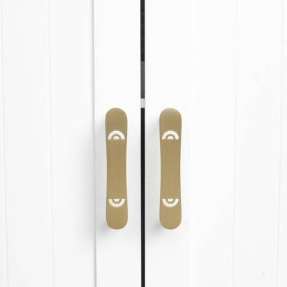 Horizon pulls in satin brass on modern white cabinet doors