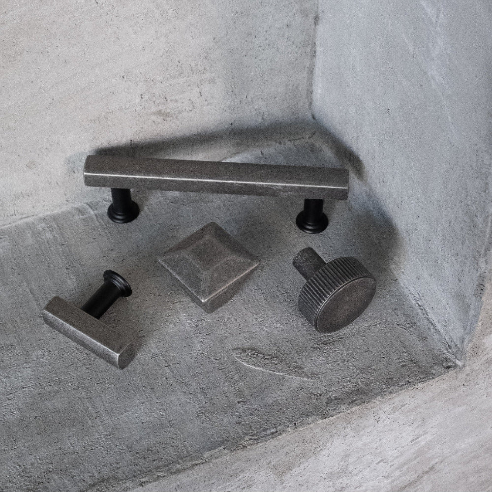 Industrial cabinet pulls and knobs in weathered nickel - modern hardware with distressed gray tone finish