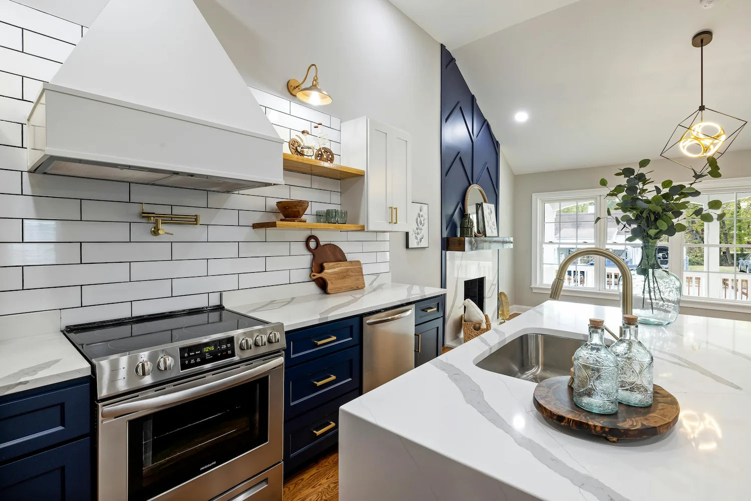Modern cabinet pulls in satin brass -contemporary kitchen drawer handles on blue tone cabinets
