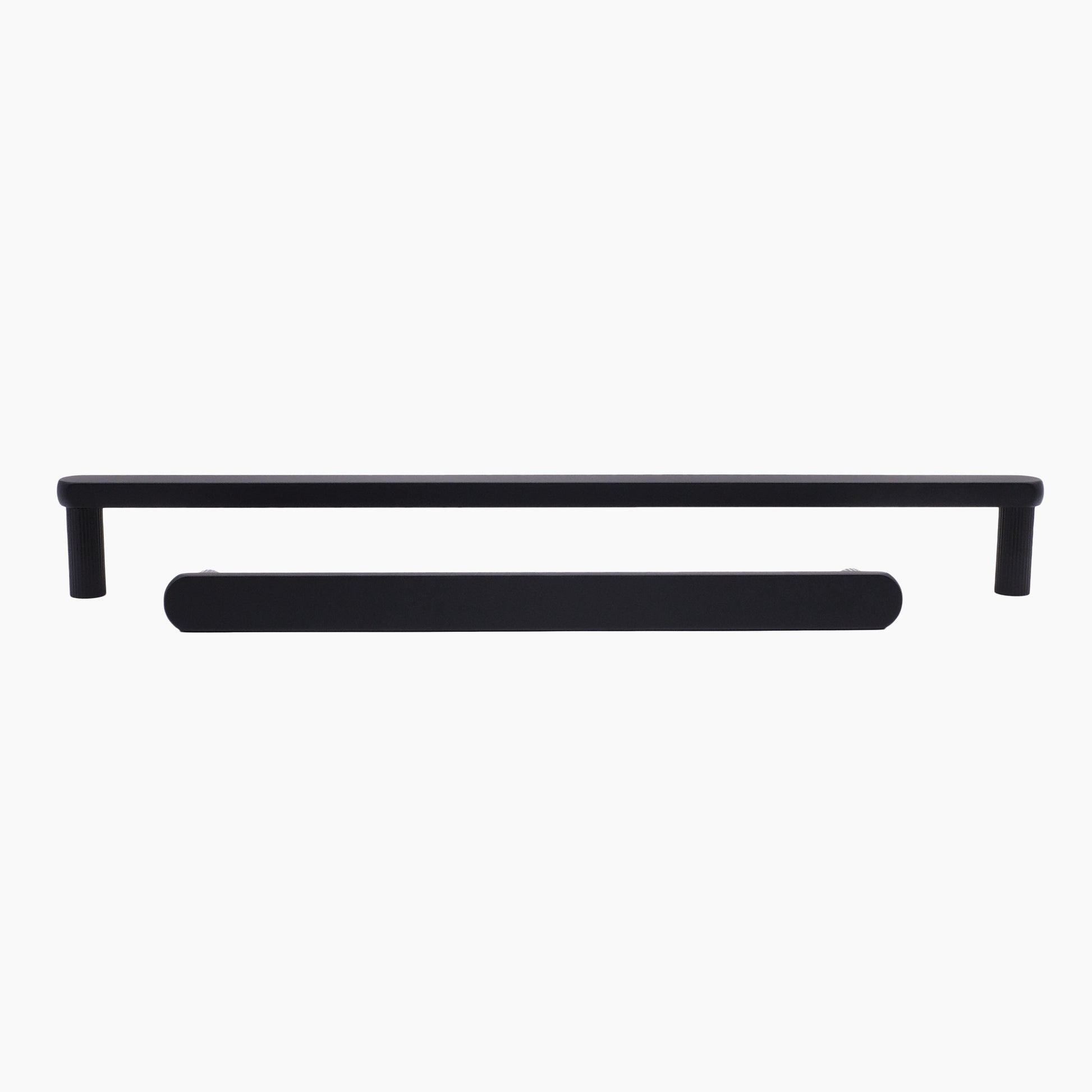 Ribbed appliance pulls in matte black with contemporary grooved stems