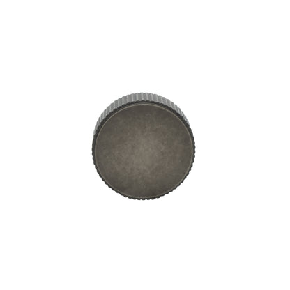 Modern round ribbed knob in weathered nickel made of solid brass and smooth touch