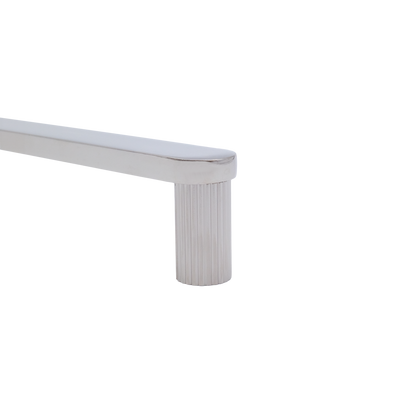 Ribbed pull in polished nickel with grooves and modern etching