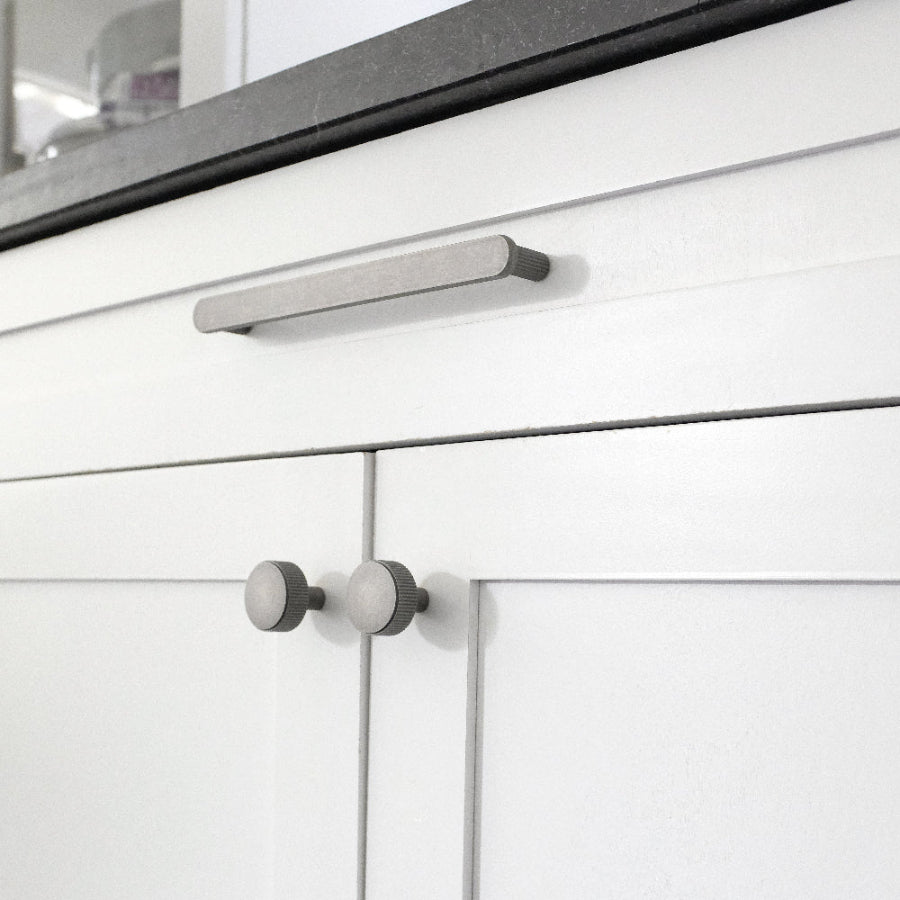 Ribbed pull and knob in weathered nickel - modern style for kitchen and bathroom