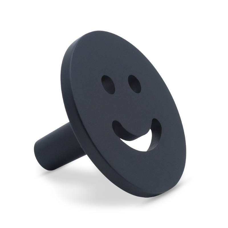 Smiley knob in matte black for modern spaces with playful style